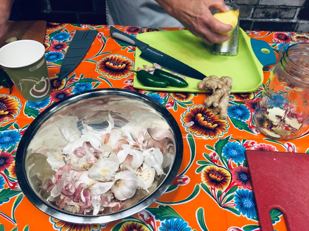 A person is preparing food on the table.